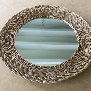 Mirror in woven plant fibers, rattan