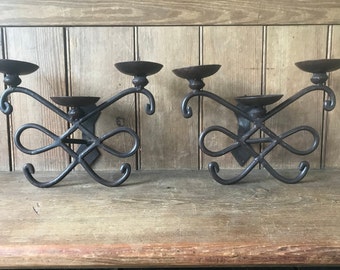 Wall candlesticks, pair of wrought iron candlesticks, each for 3 candles