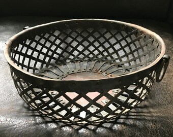 Round openwork metal basket