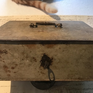 Old metal box with key