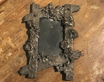 Metallhängram, tidigt 1900-tal