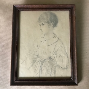 Pencil drawing, young woman seated in profile.