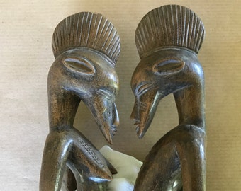 Coppia di statuette africane Senoufo, legno intagliato