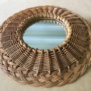Mirror in woven plant fibers, rattan