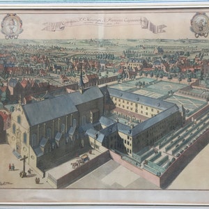 May include: An antique print depicting a bird's eye view of a monastery complex with a large garden and surrounding buildings. The print is titled "Convento F.F. Minori S. Francesco Cappuccini" and is dated 1717.