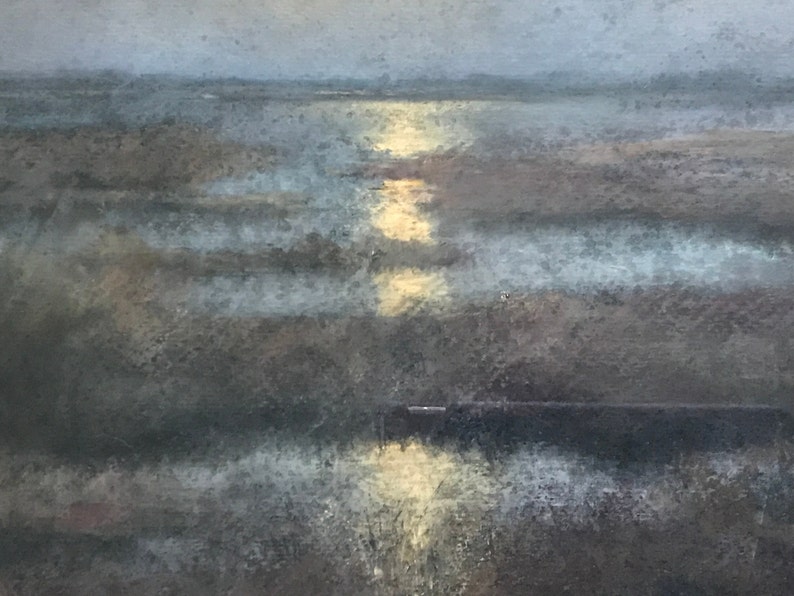 May include: A painting of a landscape with a muted blue and gray color scheme. The sky is a light gray, and the ground is a darker gray with hints of brown. The painting depicts a body of water with a reflection of light in the center.