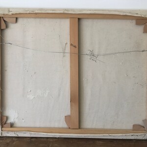 May include: The back of a canvas painting with a wooden frame. The canvas is white and has a few small brown marks. The frame is made of natural wood and has a few small scratches. The painting is signed "H. Paul" and dated "2002".