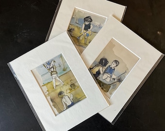 May include: Three framed watercolor paintings of children playing on the beach. The paintings are on white mats and have a white background. The children are wearing summer clothes and are playing with toys.