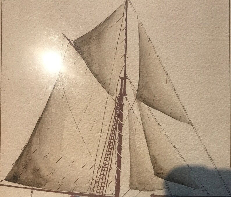 May include: A black and white drawing of a sailboat with sails billowing in the wind. The sails are detailed with stitching and the mast is visible.