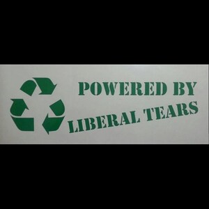 May include: Green recycling symbol with the text "POWERED BY LIBERAL TEARS" on a white background.