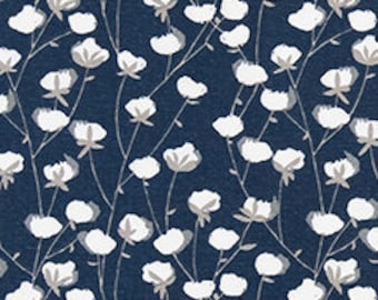 May include: A navy blue fabric with a white floral pattern. The flowers are small and delicate, and the stems are thin and wispy.