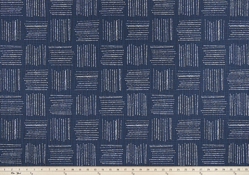 May include: A navy blue fabric with a white geometric pattern of squares and lines. The fabric has a subtle texture.