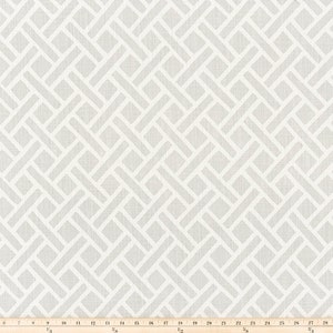 May include: White fabric with a geometric pattern of woven white lines on a light gray background. The fabric is measured in inches.
