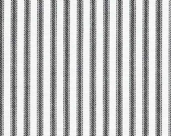 May include: White fabric with black vertical stripes. The stripes are made of small black dots.