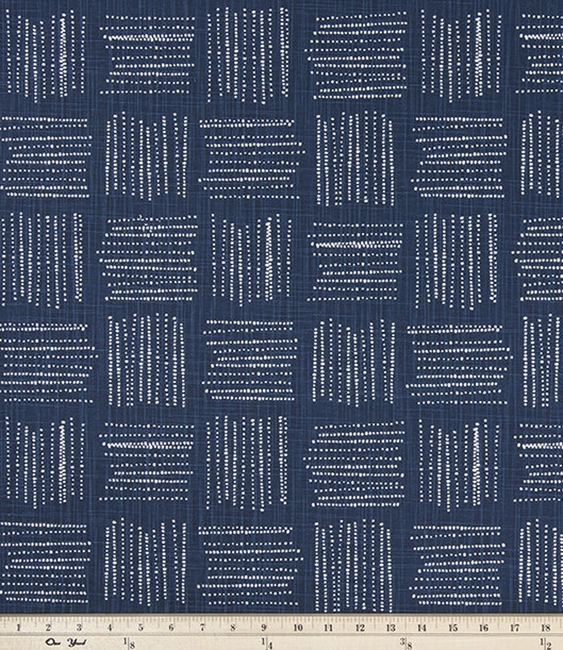 May include: A navy blue fabric with a white geometric pattern of dots and lines. The fabric has a subtle texture.