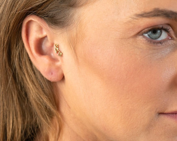 Real gold tragus best sale earrings