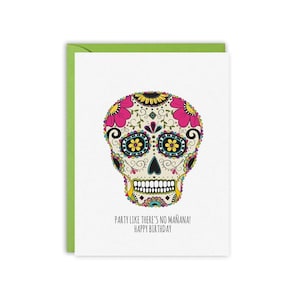 May include: A white card with a colorful sugar skull illustration and the text "Party like there's no mañana! Happy Birthday".