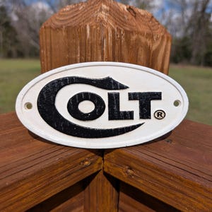 Cast Iron Oval Colt Firearms Sign Plaque Garage Fence Yard Sign Mounts Flush To Wall
