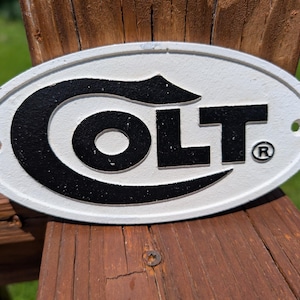 Cast Iron Oval Colt Firearms Sign Plaque Garage Fence Yard Sign Mounts Flush To Wall