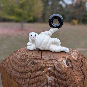Small Cast Iron Laying Down MICHELIN Man Bibendum Figurine Advertising Tire Toy Display Statue Promotional