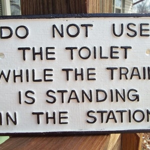 Large Heavy Hand Painted Cast Iron RAILROAD SIGN Do Not Use The Toilet While The Train Is Standing In The Station  Sign Plaque Free Shipping