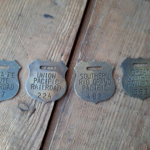 Set of 4 BRASS RAILROAD Tags or Fobs Santa Fe, Great Northern, Southern Rio Grand Pacific, & Union Pacific