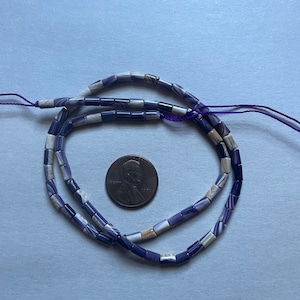 5002 5x3mm strand wampum quahog shell Beads purple color 16”