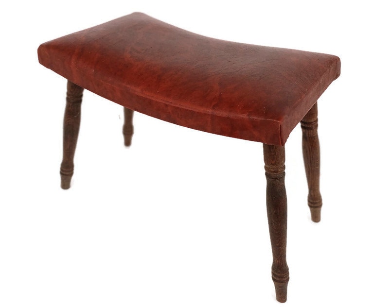 repose-pieds ottoman vintage pieds en bois simili cuir moderniste funky