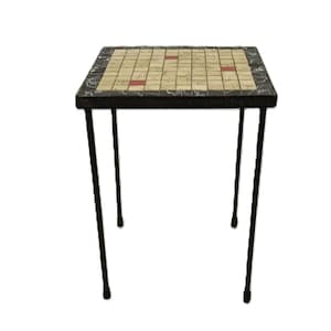 May include: A small, square side table with a mosaic tile top. The tabletop features a grid pattern with beige and red tiles, framed by a dark border. The table has thin, black metal legs.