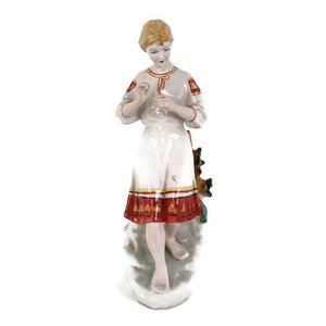 Figurine Statue Porcelain Marked Girl with flower in hand Vintage lovely