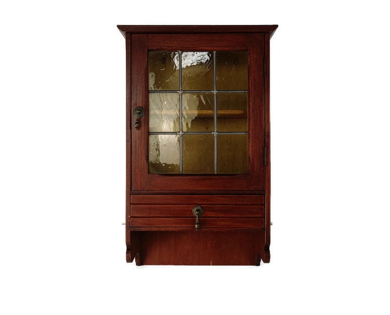 armoire à pharmacie antique magnifique porte en verre au plomb de couleur ambre apothicaire