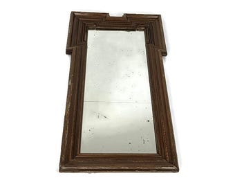 Espejo antiguo con marco de madera estilo art déco para pasillo y baño.