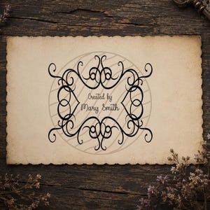 May include: A rectangular piece of aged, off-white paper with scalloped edges featuring a black, intricate, symmetrical scrollwork frame design. Centered within the frame is the black text "Created by Mary Smith" in a cursive script font.