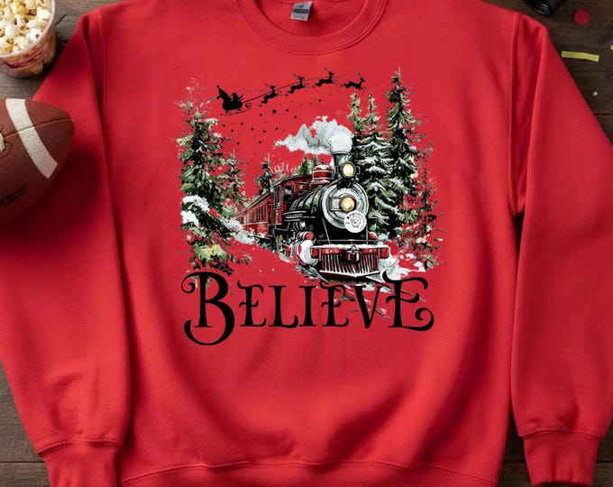 Believe North Pole Train Shirt – Christmas T-Shirt or Sweatshirt – Retro Holiday Express Design – Unisex Crewneck
