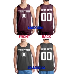 Pode incluir: Duas vistas de uma camisa de basquete sem mangas com o n&uacute;mero branco "00" em um fundo vinho e carv&atilde;o. A frente da camisa diz "Your Team" e as costas dizem "Your Text".