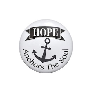 May include: White button with a black anchor and the text "HOPE Anchors The Soul".