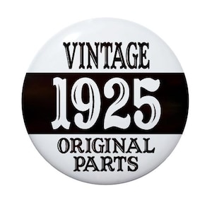 May include: A white button with black text that reads "Vintage 1925 Original Parts".