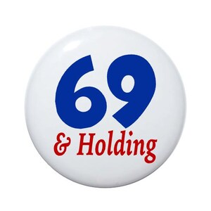 May include: A white button with the number 69 in blue and the text "& Holding" in red.