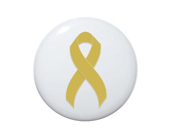 May include: A gold ribbon on a white background. The ribbon is a symbol of awareness and support for various causes.