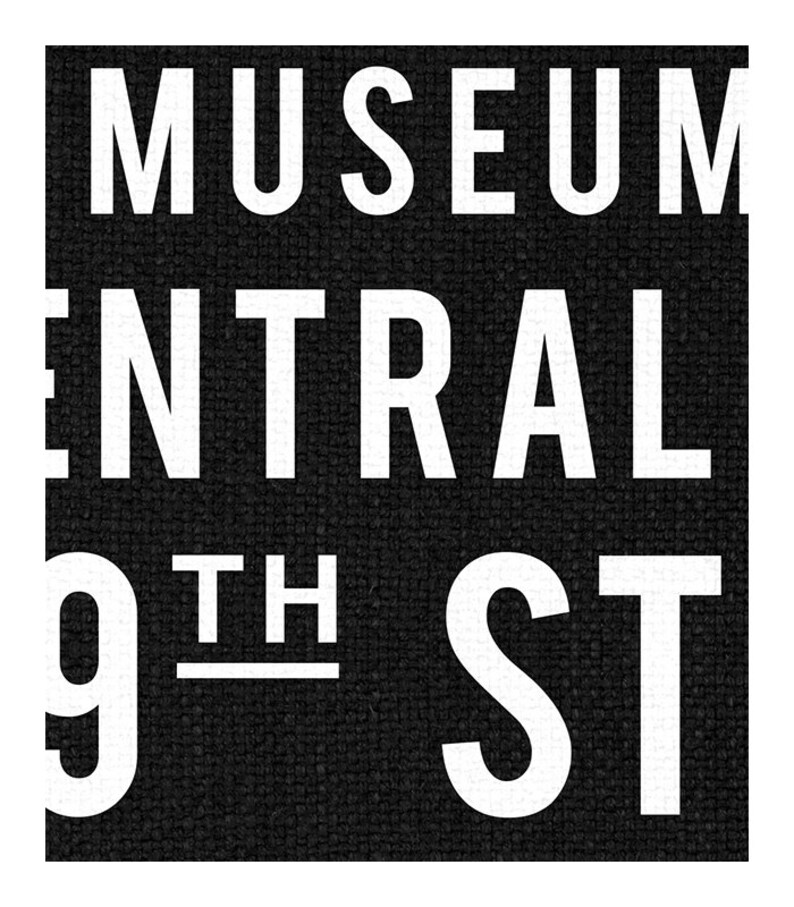 May include: Black and white sign with the text "Museum Central 9th St" on a black background.