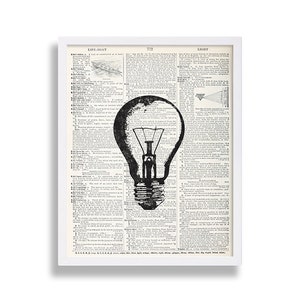 May include: A black and white illustration of a light bulb superimposed over a page from a vintage dictionary. The dictionary page features the definition of the word "light".