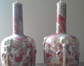 Mirrored pair Kyoto Satsuma bottle vases with lids