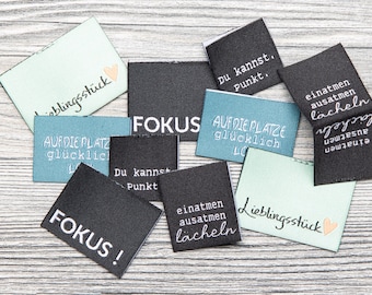 Juego de etiquetas textiles tejidas de 100 % poliéster (rPET) “Focus” de Unikati – 10 etiquetas para coser, 9115