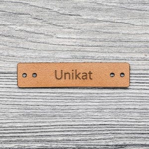 Unieke, natuurlijk leren opnaailabels voor kleding en hoeden/accessoires, 10 stuks, 8004