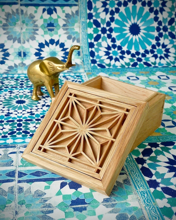 Kumiko joinery is one of the most painstaking traditional Japanese woodworking techniques — this keepsake box looks like a piece of architecture, not a trinket box, and 64 hearts back that up.