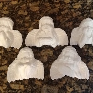 May include: Set of six white ceramic angel figurines with wings, each with a different pose. The angels are all in a praying position with their hands clasped together.