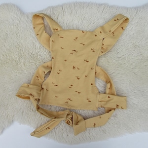 Birdflight wheat cuddly toy and/or doll carrier for toddler/preschooler