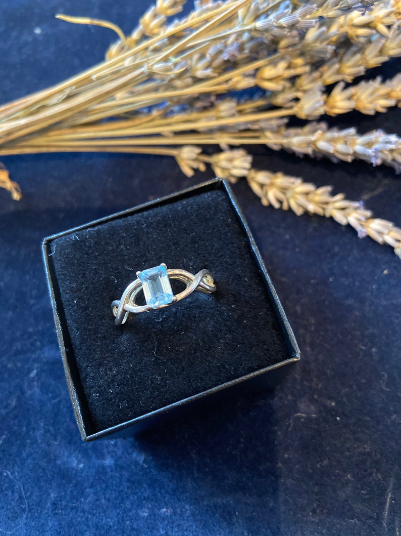 ring Size 7 twisted knot setting Sterling silver ring for woman with light blue stone