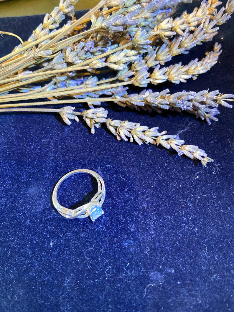 ring Size 7 twisted knot setting Sterling silver ring for woman with light blue stone