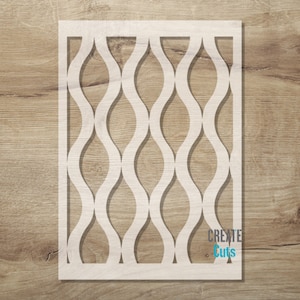 May include: A rectangular stencil featuring a repeating vertical wave pattern with interconnected curved lines. The stencil is light beige and includes the text "CREATE Cuts" in the bottom right corner in dark gray and light blue lettering.